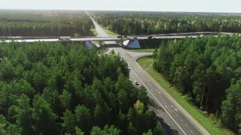 Aerial view of traffic intersection, road interchange. Trucks and cars are Stock Footage 139879371