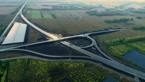 Aerial view of the traffic intersection on a sunny evening.. Transport Stock-Footage 138120485