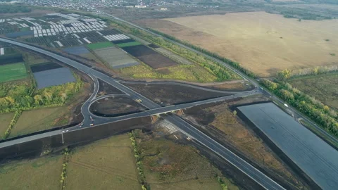 Aerial view of the traffic intersection. Transport interchange of highways. Road Stock-Footage 138039525