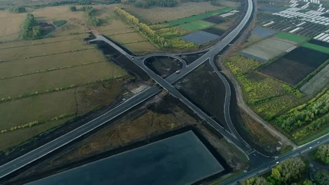 Aerial view of the traffic intersection. Transport interchange of highways. Road Stock Footage 138135347