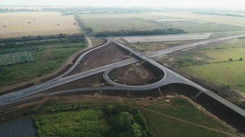 Aerial view of the traffic intersection. Transport interchange of highways. Road Stock-Footage 138154455