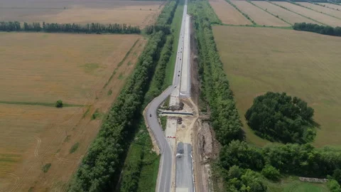 Aerial view of a traffic intersection under construction. Transport highways Stock-Footage 137872142