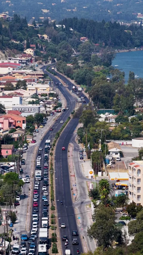 Aerial view of traffic jam and cars on main avenue in Corfu, Greece Stock Footage 346175297