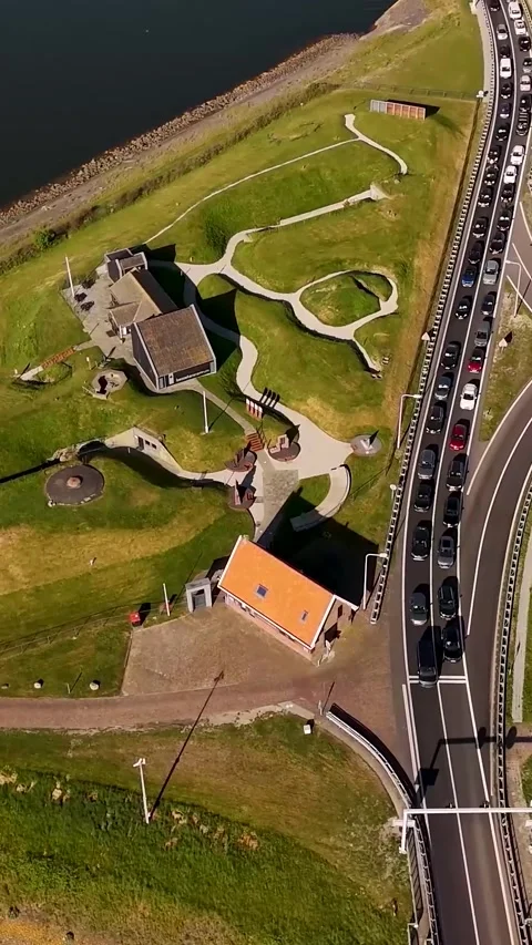 Aerial view of traffic jam next to a park in the netherlands Stock Footage 327113676