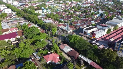 Aerial view of the traffic light intersection on Jalan Veteran Banjarmasin .. Stock-Footage 320221603