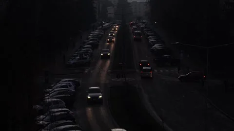 Aerial view of the traffic on the main boulevard of the city at late evening. Stock Footage 321546969