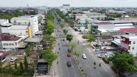 Aerial view of traffic on the main road in Banjarmasin city, South Kalimant.. Stock Footage 317002035