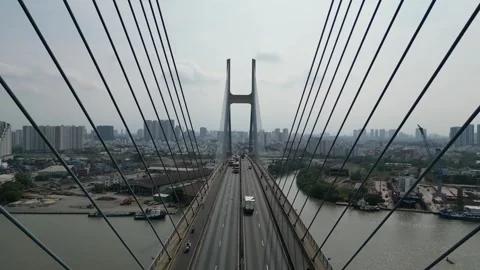 Aerial View of Traffic on a Modern Cable Stayed Bridge in Ho Chi Minh City, Stock Footage 335576730
