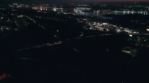 Aerial view of traffic at night intersection in Dartmouth, capital Nova Scotia Stock Footage 275609017