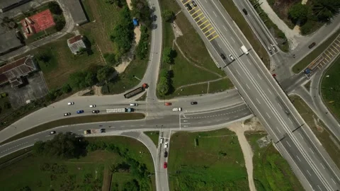 Aerial View of Traffic Patterns and Roads in Malaysia During July Showcasing Stock Footage 316446859
