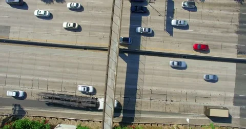 Aerial  View of Traffic at rush hour on Los Angeles Freeway, California, 4K Stock Footage 55574697