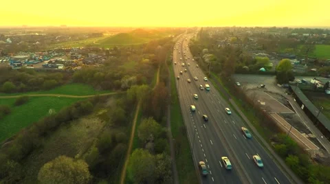 Aerial view of traffic at sunrise Stock Footage