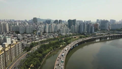 Aerial View of traffic through an intersection at Mapo Bridge Seoul South Korea Video stock 244926268