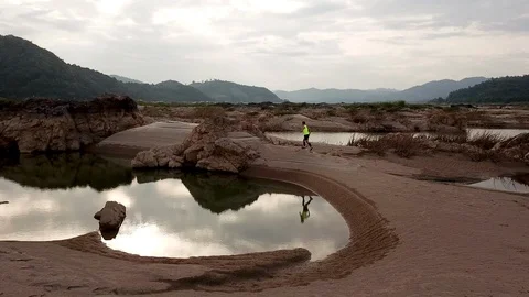 Aerial view the trail runner of man  in the Mekong river Stock Footage 119005444