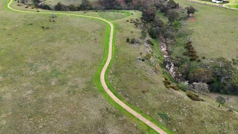 Aerial view of trail at valley of Toolern Creek in Strathtulloh, Australia. 스톡 동영상 344909786