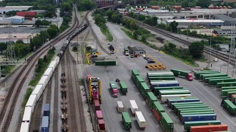 Aerial view of train and container yard, United States. Stock Footage 316142292