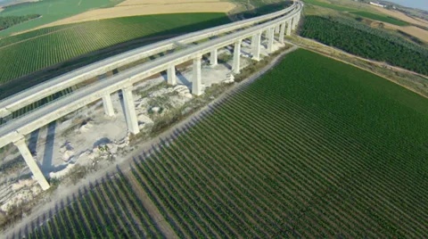 Aerial view of train bridge and vineyard Stock-Footage 38419281
