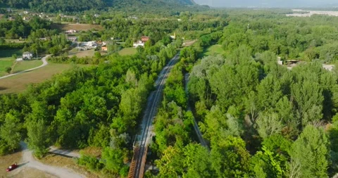 Aerial view of Train Bridge spanning over small River Video stock 203285995
