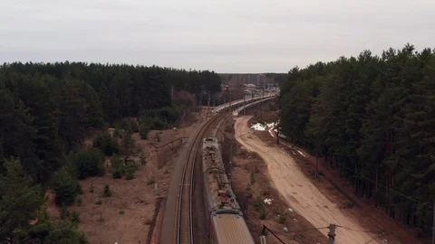 Aerial view of train. Camera follows the train. Stock Footage 107228930
