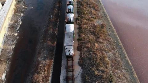 Aerial view of a train carrying the salt Stock Footage 100464355