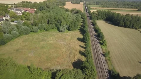 Aerial view of train in the countryside Stock Footage 168386192