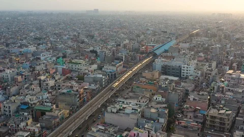 Aerial view of train crossing New Delhi public transport system, India. Stock Footage
