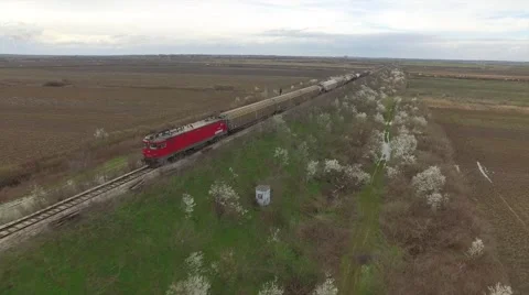 Aerial view of train going through fields Stock Footage 61100544