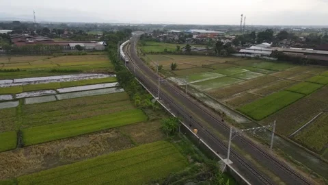 Aerial view of a train moving on the tracks Stock Footage 259931608