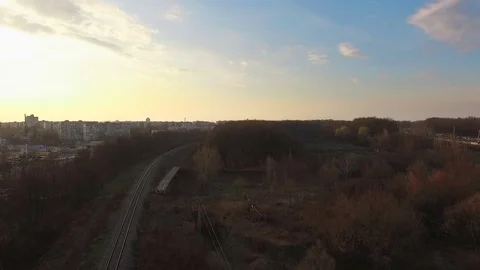 Aerial view of train over railway in the forest Stock Footage 74466178