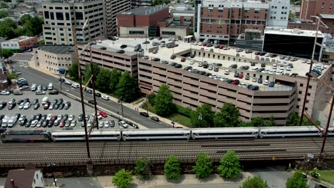 Aerial view of a train passing through New Brunswick Stock Footage 197013079