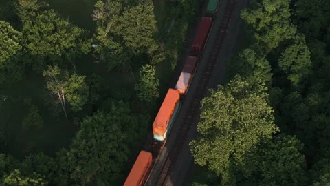 Aerial view of a train passing through Pennsylvania's Lehigh Valley Stock Footage 342547131