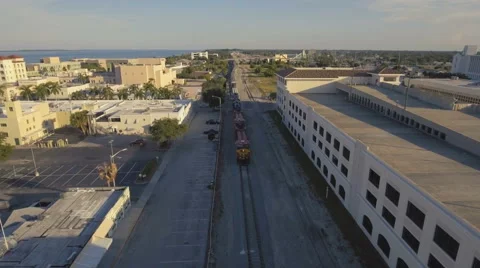 Aerial View of Train in Small Town Stock Footage 67559587