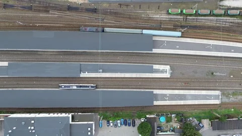 Aerial view of train station with tracks and platforms during daytime Stock Footage 281404413