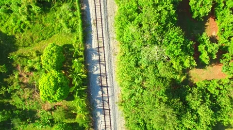 AERIAL - View of Train Tracks coming down  Stock Footage 64993911