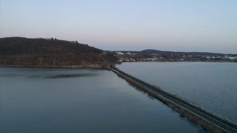 Aerial View of Train Tracks Over Hudson River at Sunset Stock Footage 94687865