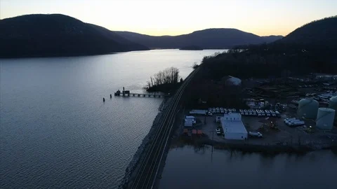 Aerial View of Train Tracks by the River in Peekskill NY at Sunset Vídeo Stock 94687926