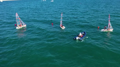 Aerial view of training with sailing boats near the Marina Valencia, Spain. Stock Footage 167846337