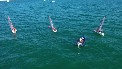 Aerial view of training with sailing boats near the Marina Valencia, Spain. Stock Footage 167846653