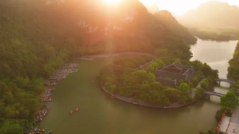 Aerial view of trang an complex with boats cruising on the river in ninh bi.. Video stock 335091204