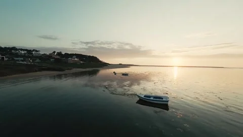 Aerial view of tranquil bay during golden hour Stock Footage 340227707