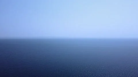 Aerial view of tranquil blue open sea under the blue sky Video stock 139005917