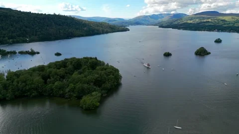 Aerial view of tranquil lake with scattered green islands Stock Footage 345522288