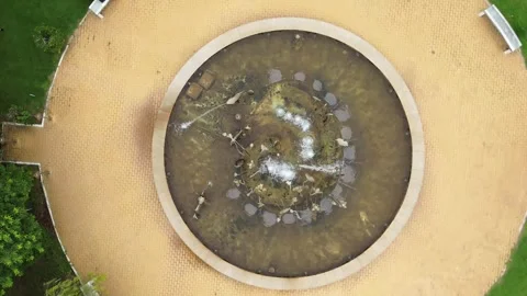 Aerial View of Tranquil Park Featuring Circular Fountain Surrounded by Greenery Stock Footage 280803801