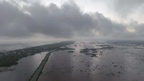 Aerial view of tranquil wetlands under cloudy skies, Mexico. 스톡 동영상 284848261