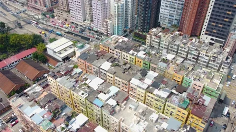 Aerial view transition from old dense building to new skyscraper, Hong Kong Stock Footage 150445719