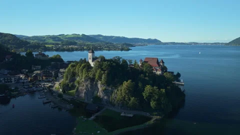 Aerial view of Traunkirchen and mountains at golden hour light, Austria Stock-Footage 332057879