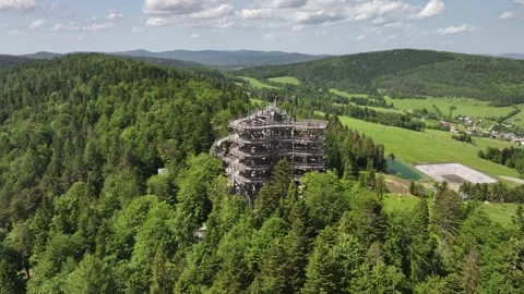 Aerial view of the tree top observation tower in resort town Krynica-Zdroj, Stock Footage 314044030