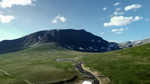 Aerial View of Trollheimen Mountain Range on a Sunny Day in Norway Stock Footage 329305675
