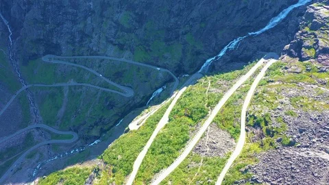 Aerial view. Trolls Path Trollstigen or Trollstigveien winding scenic mountai Stock Footage 115559649