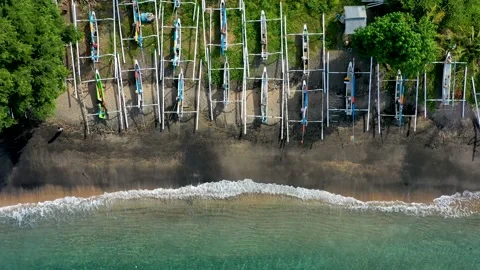 Aerial view of the tropical bay with sandy beach, boats. Village of Amed, Bali Stock Footage 138183202
